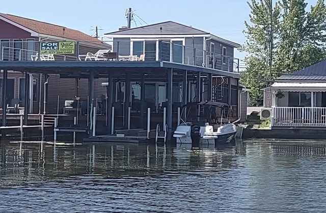 Renovated Waterfront House with MASSIVE boat house and party deck
