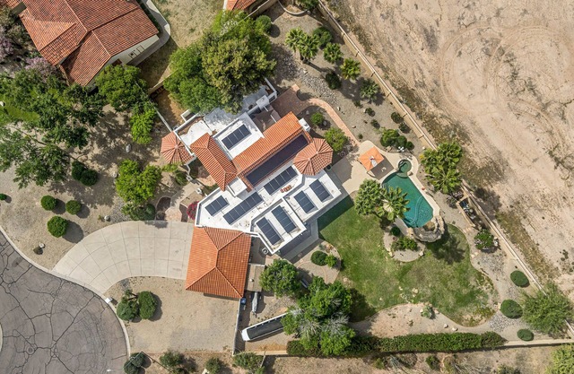 Resort style gorgeous 4 bedroom/bath home with pool and putting green.