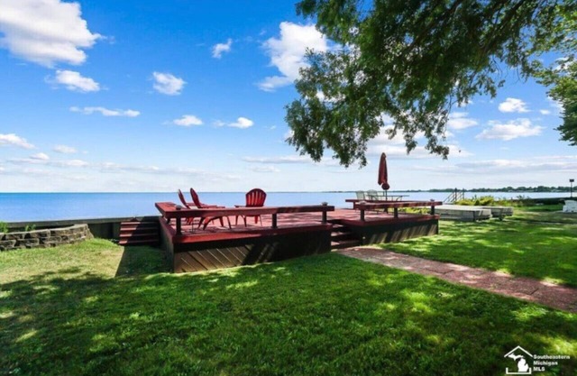 Restored historic log cabin and deck on Lake Erie