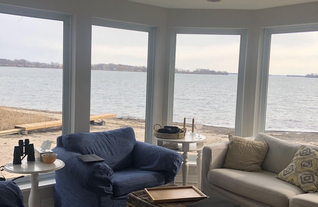 Revel at this lovely private beach house on the lake :-)