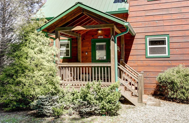 Riverfront duplex w/ mountain view, deck, private hot tub, games loft & WiFi