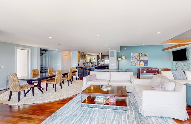 Riverfront home with private dock, foosball table, fireplace, river views