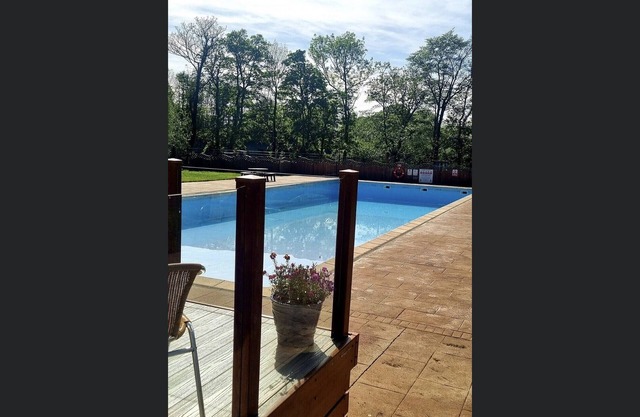 Riverside Cabin with Large Decking Area set in 120 acre Country Park, Snowdonia