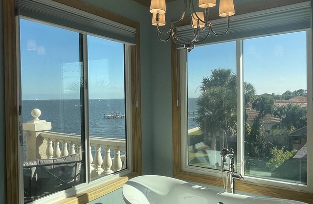Rocket Launches and River Views! Multiple balconies, huge screened in porch.