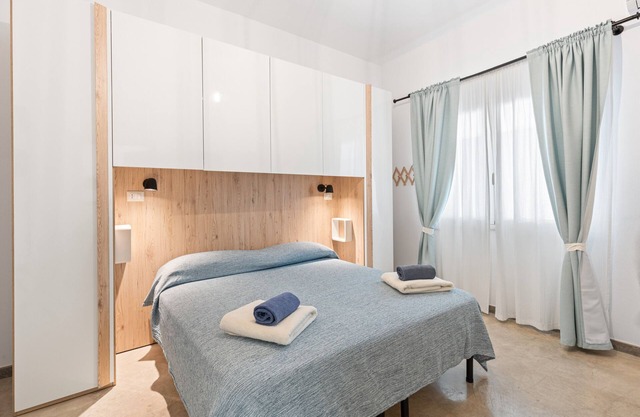 Room '40°Parallelo - Ampia Matrimoniale 4' with Shared Garden, Wi-Fi and Air Conditioning