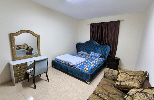 Rooms opposite mega mall in telephone shops roundabout flat no 203