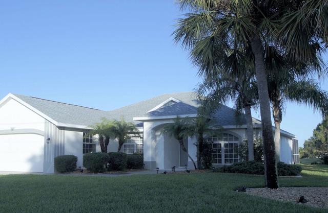 Rotonda West 3 bed/3 bath Home with serene Lake View from your private pool deck