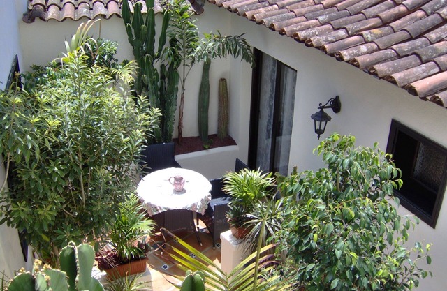 Rustic holiday home with small patio-terrace