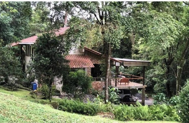 Secluded estate tucked within the tropical flora and fauna.