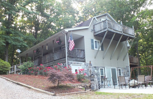 SECLUDED PARADISE! Tranquility on 8 Acres Bordering Brush Creek Forest!