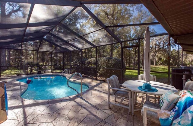 Secluded riverfront luxury home w/heated pool and private dock- Sleeps 15