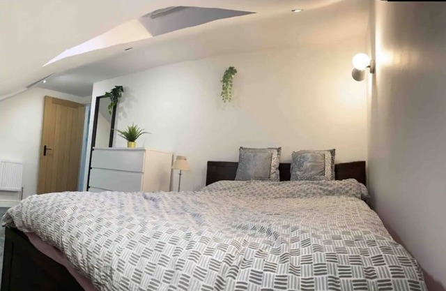 Self-contained flat with shared entrance and stairway