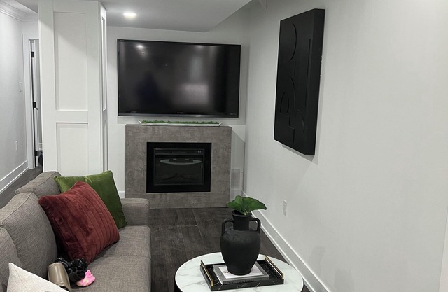 Separate entrance heated driveway close to walking trails very private