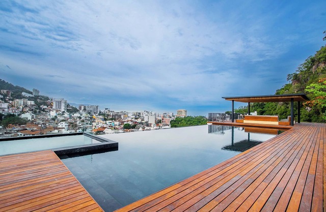 Serene 3BR Oasis | 2 Pools, Gym & Bar