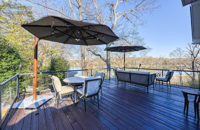 Serene, riverfront home with deck, balcony, kitchen & fireplace - dog-friendly