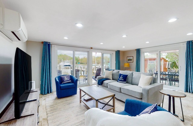 Serene waterfront home with kayaks, paddle board, grill, firepit, W/D, and AC
