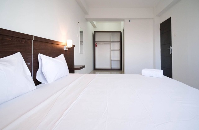 Simple 2Br With Extra Bed At Menara Rungkut Apartment