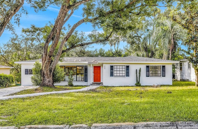 Single-level home with pool, fenced yard, & screened porch + a neighborhood park