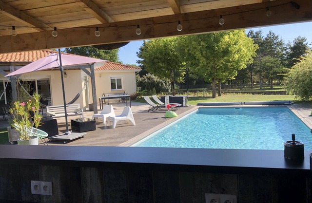 Single storey house with heated pool