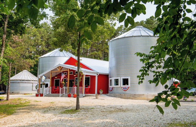Sleeps 8 in a 2-story grain bins (2 queen beds, 1 queen bunk bed and 2 full bathrooms; each grain bin level has its own full bathroom) All guests of the Hermann Grain Bins have full access to the full service kitchen, dining area, living room comp