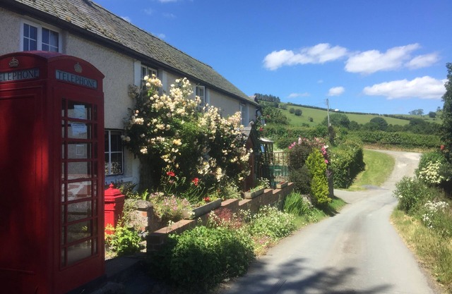 Sleeps 14-18. Hot tub, games room, woods