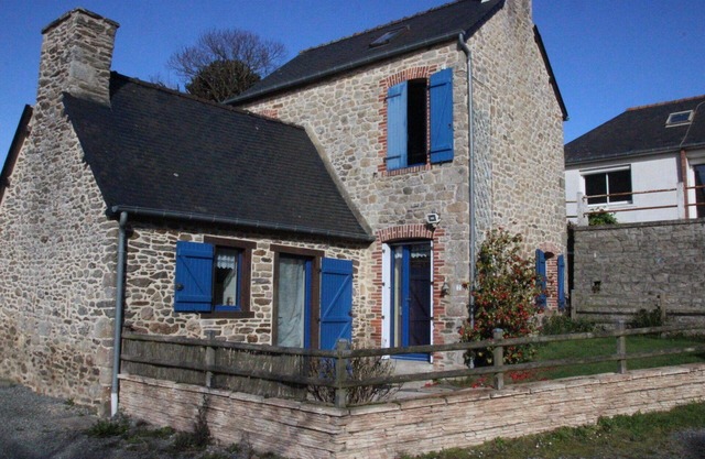 Small charming stone house between land and sea