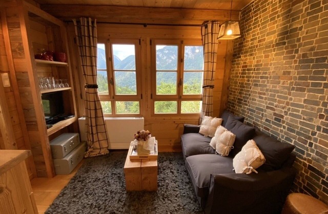 Small cozy n'est perched in the mountains