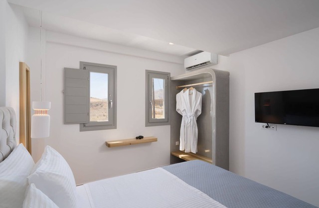 Sophisticated Santorini Suite | Two Bedroom Suite with Private Hot Tub |.
