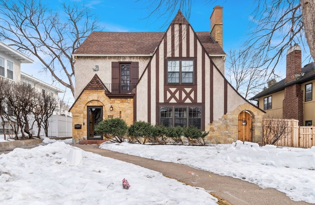 Sophisticated Upstairs Flat in Tudor-Style Duplex