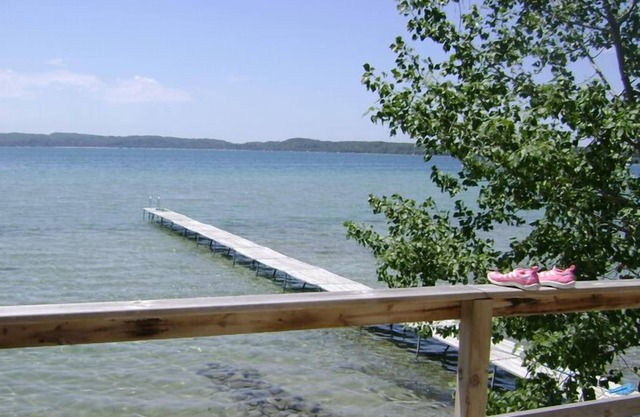 Sought-After West-End, Designer Cottage Right on Water