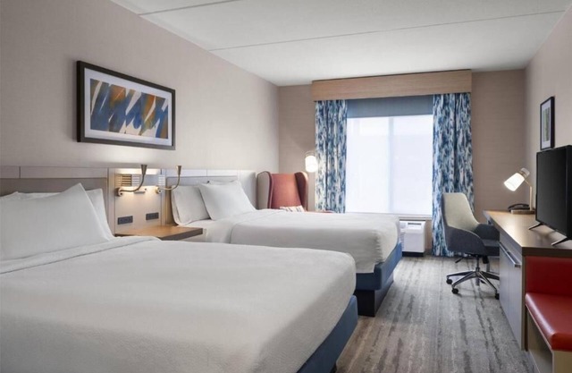 Spacious 2 Queen Suites | Pool, Dining, & Bar Area