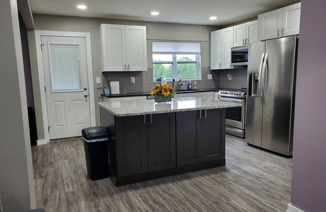 Spacious 3-bedroom home, off I-64 & 35, sleeps 11