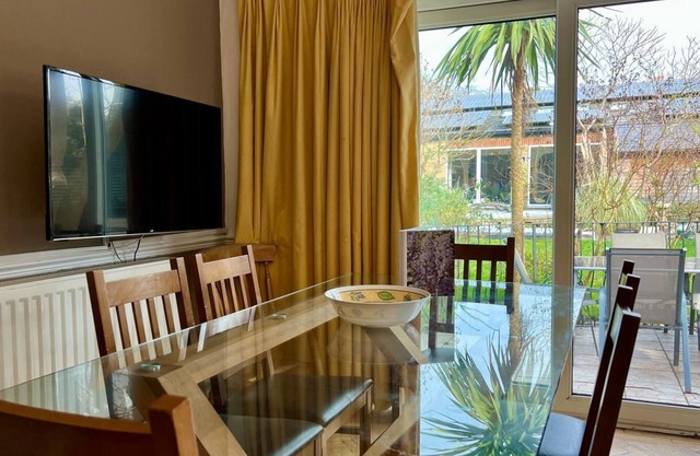 Spacious 4 bedroom ground floor apartment with indoor pool and offroad parking