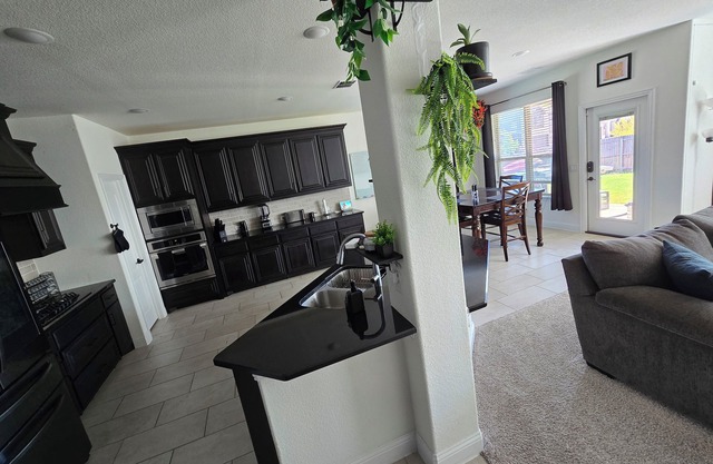 Spacious 4-bedroom Smart Home in Argyle with AC/Heat, small gym, and TVs galore