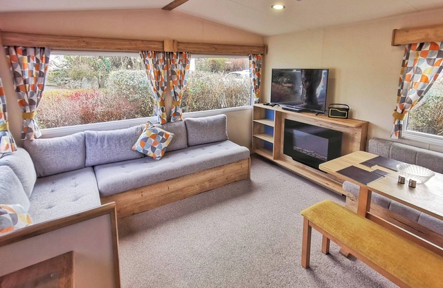 Spacious and well presented 12ft wide caravan with one double and two twin.
