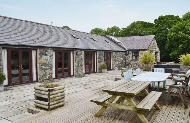 Spacious barn conversion with a riverside location.