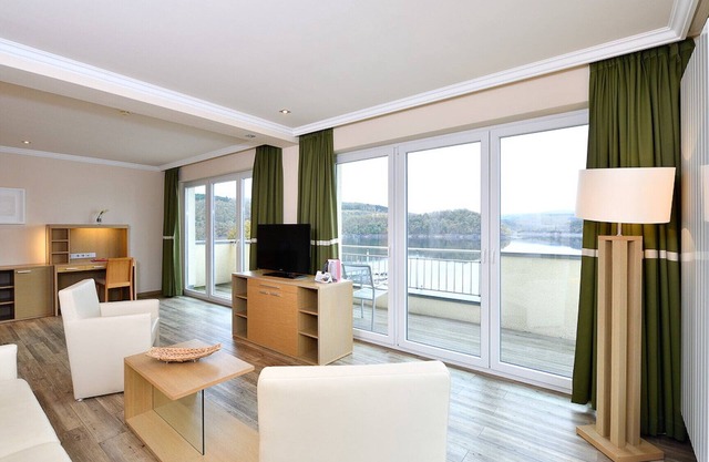 Spacious double suite with balcony and lake view
