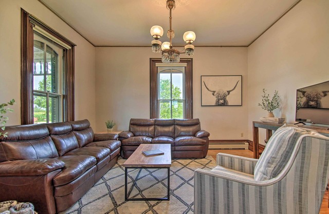 Spacious Farmhouse on 200 Acres Along the River
