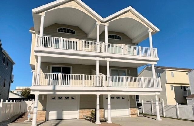 Spacious front decks boast both ocean and bay views