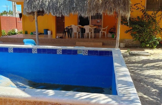 Spacious Gated Beach House with a pool. Less than 150 meters from the beach
