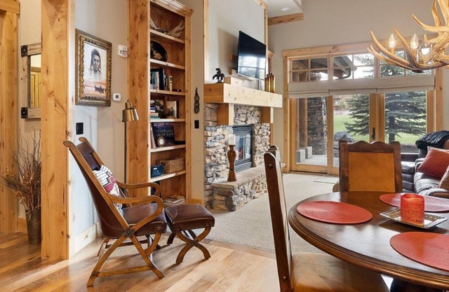 Spacious ground-level condominium with large patio and private office/bedroom