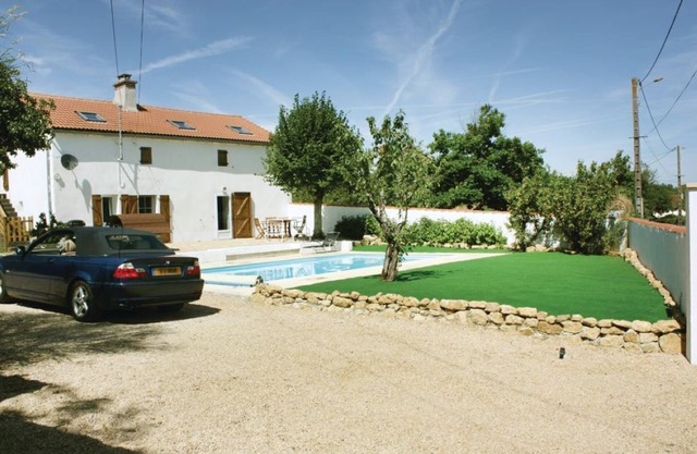 Spacious holiday home with heated swimming pool and outside space.
