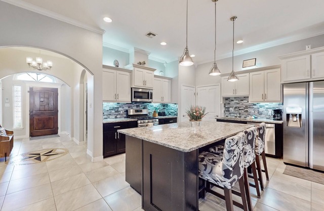 Spacious home with enclosed yard & near attractions