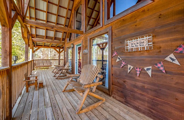 Spacious home with covered deck, fireplace, pool table, hot tub, & W/D