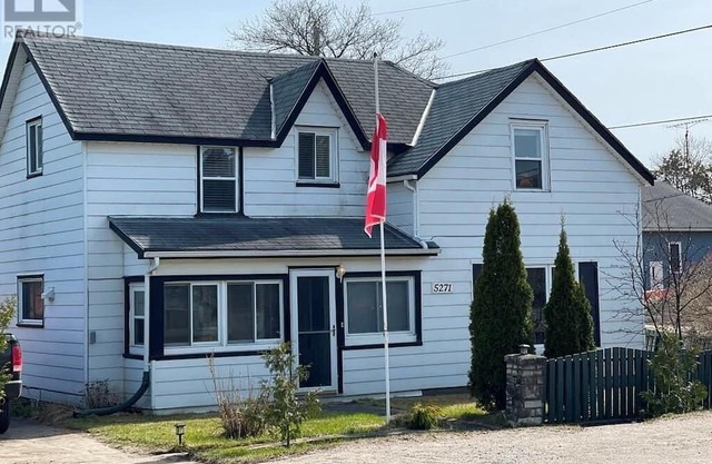 Spacious house steps off beach and boardwalk in Providence Bay!