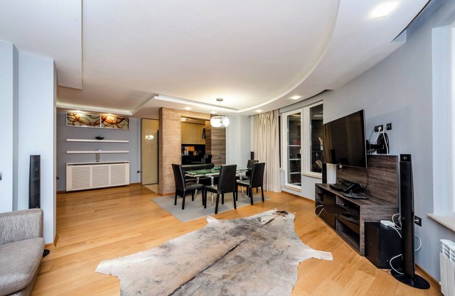 Spacious modern apartment. Large balcony overlooking the city line and mountains