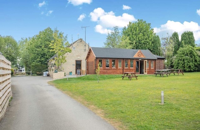 Spacious modern one-bedroom caravan exclusively for two adults with hot tub.