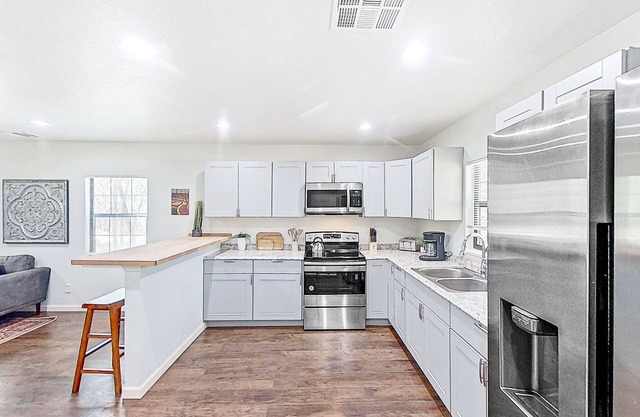 Spacious property with four cabins, decks, grills, & open layouts - dog-friendly
