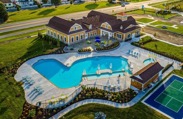 Spacious townhouse near Bethany Beach with community pool, patio, & firepit