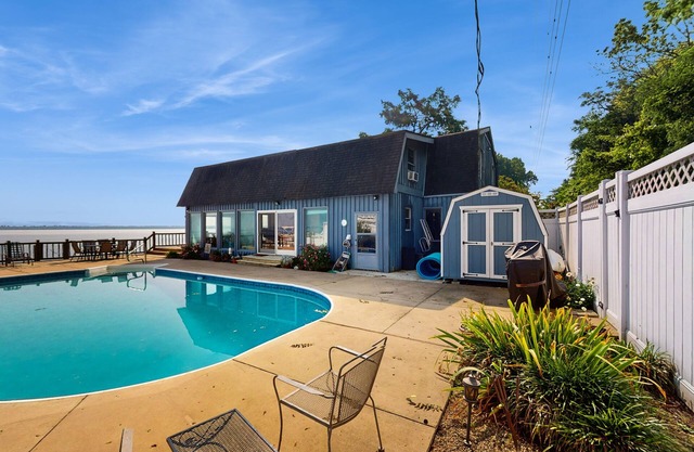 Spacious waterfront house with private heated seasonal pool + dock